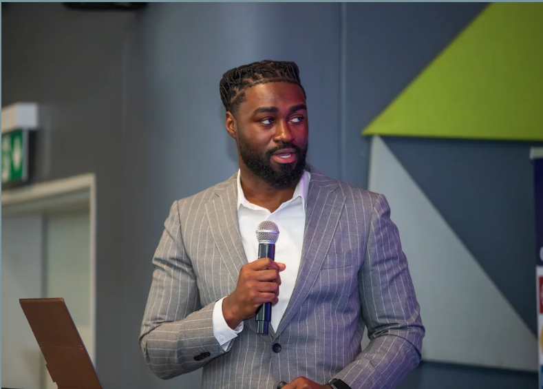 Sackey Solutions leadership speaking at an industry event